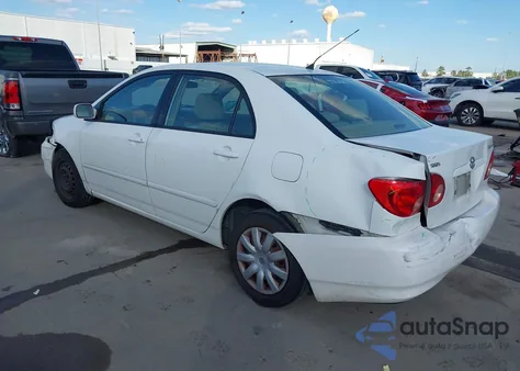 2005 Toyota Corolla Le z USA, uszkodzony, nr VIN JTDBR32EX52059142